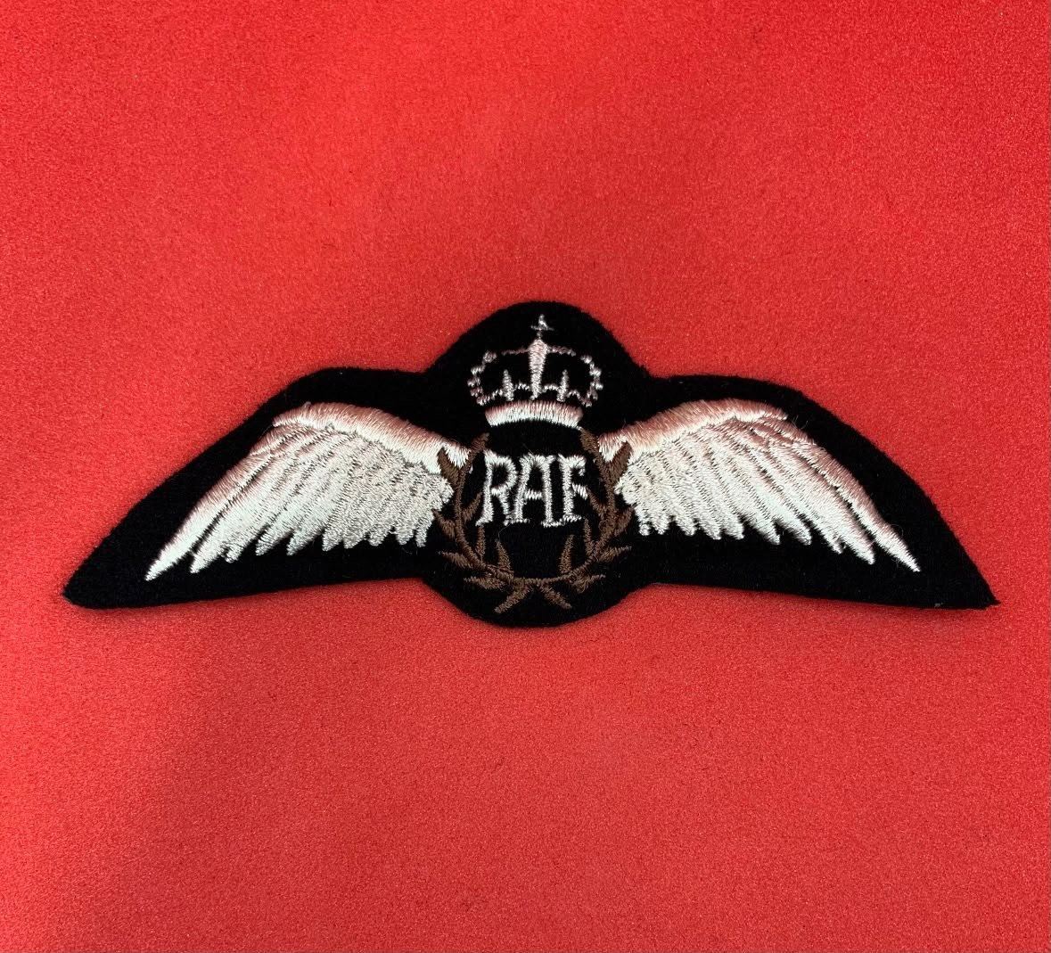 Pilot wings patch with crown and wreath on black felt