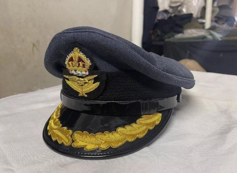 Grey air force cap, crown and eagle badge with oak leaf peak