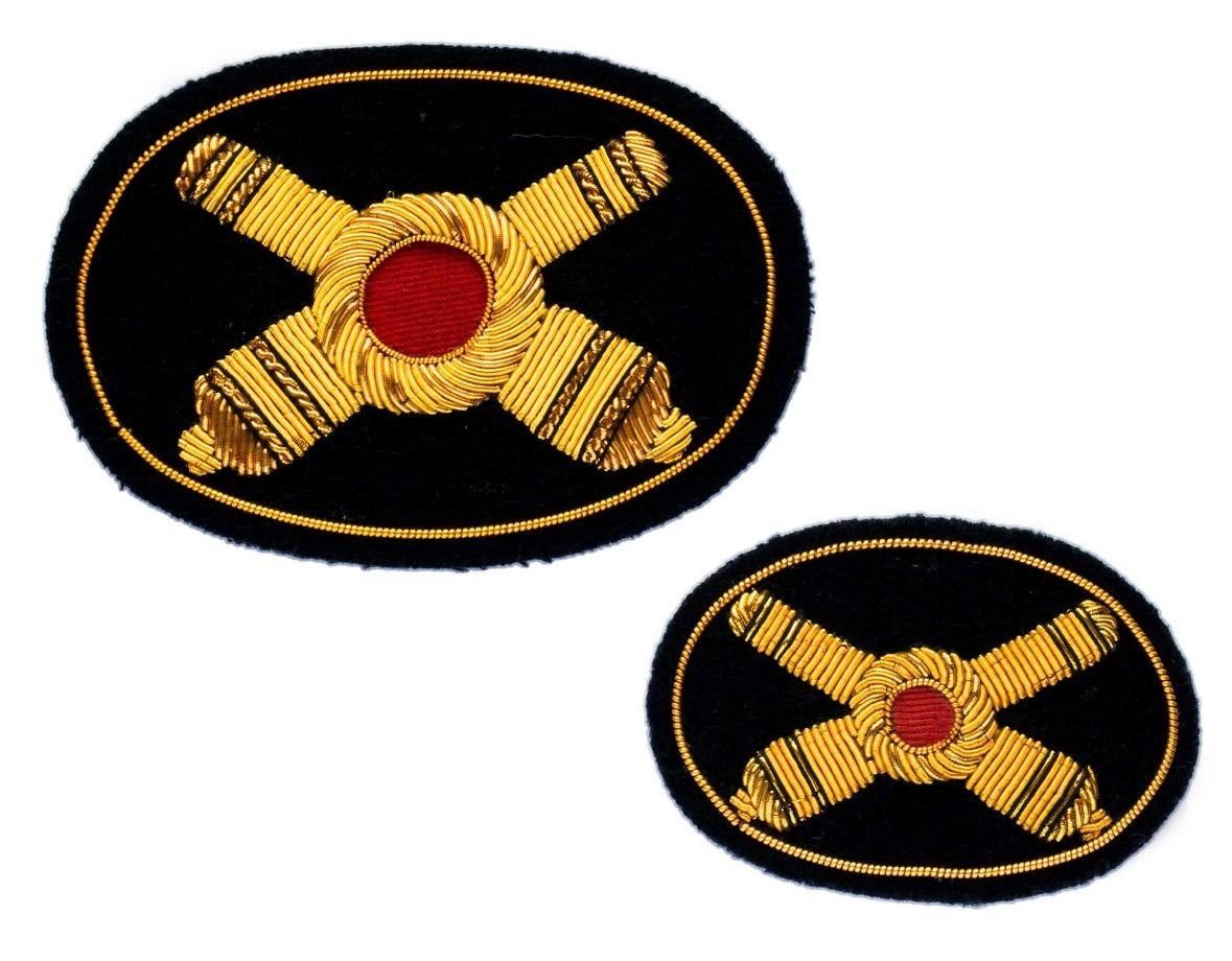 Crossed cannon artillery insignia, two sizes