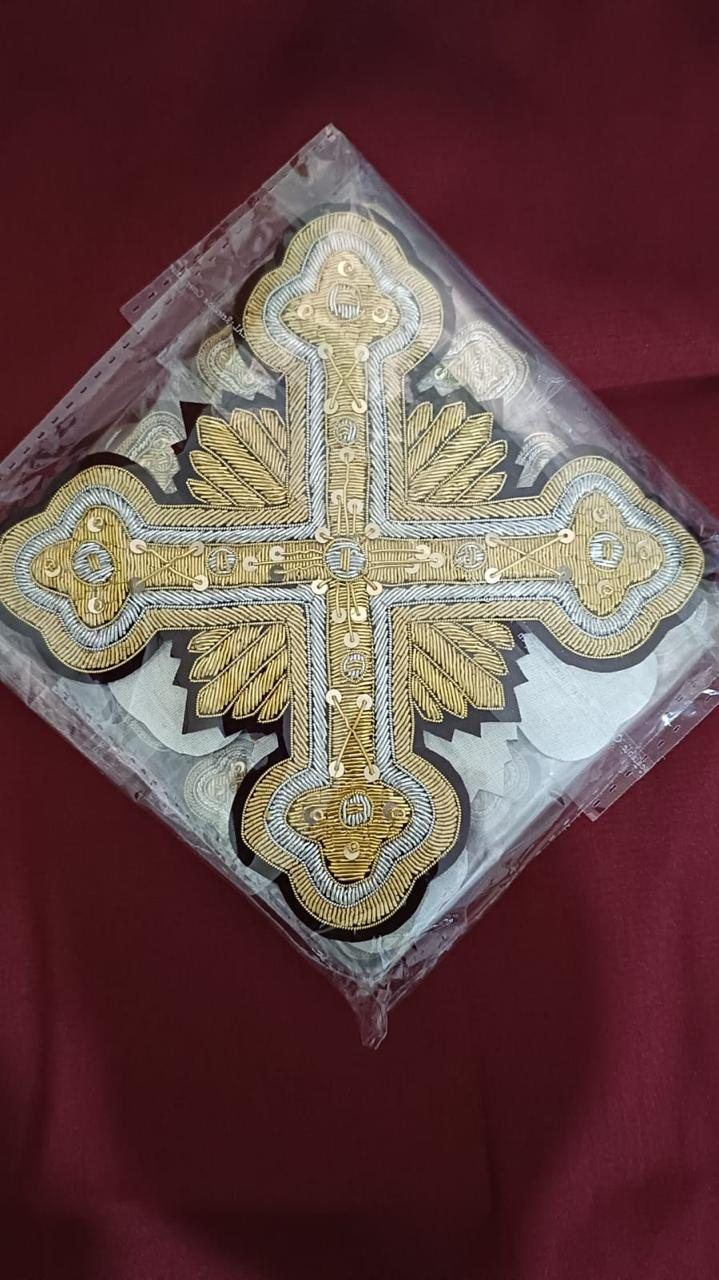 Budded cross in gold and silver with sequins