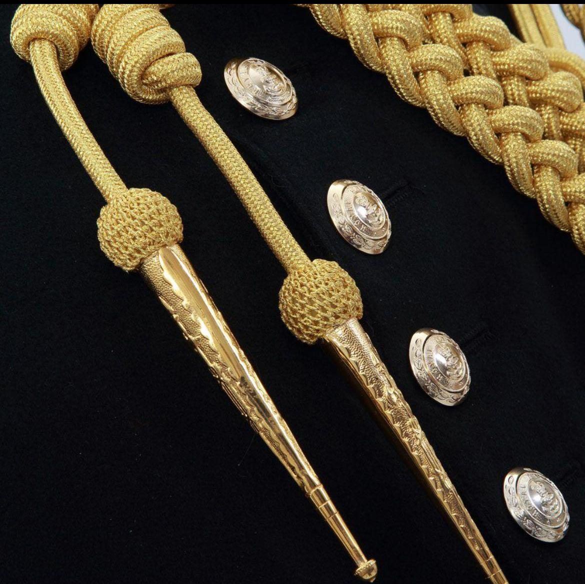 Aiguillette tips and knots in gold with crested buttons